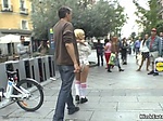 Nude blonde in strait jacket in public 