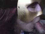Masked babe sucks a small dick 