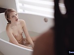 Interracial lesbian sex in the bath tub 
