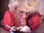 Very hot granny with glasses smoking while sucking dick 
