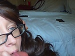 Milf with glasses suck dick and get facial 