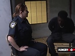 Black suspect fucks two naughty MILF cops 