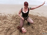 Bbw pissed buried up in sand on the beach 